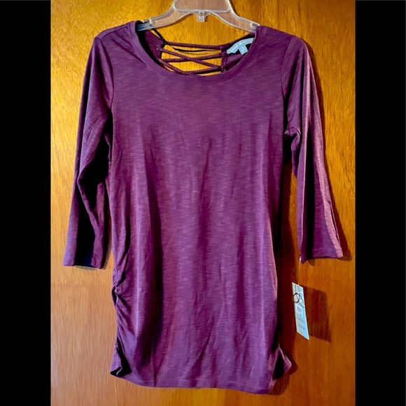 Small Purple top, cross cross in the back with ruching on the bottom sides. - Picture 1 of 3
